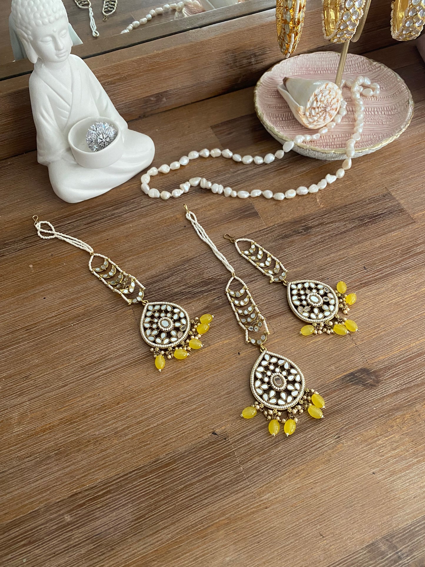 mirror earrings and tikka yellow